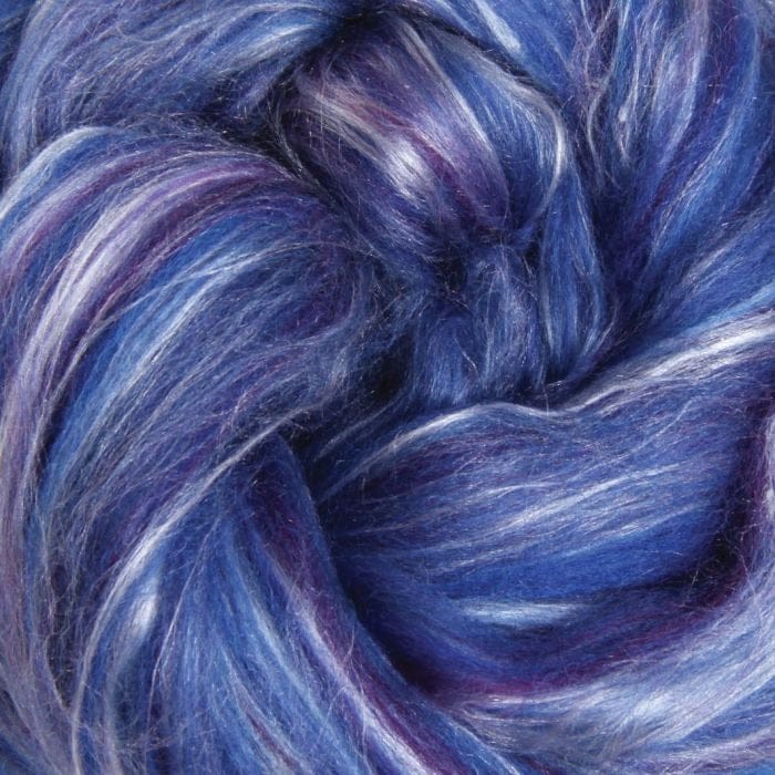 Close-up of blue and purple fibre blended with streaks of silk