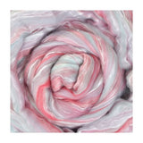 Close-up of pink and white marbled fibre with touches of light blue gray

