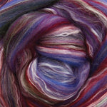 Close-up of multicolored fibre with shades of purple, blue, and red.
