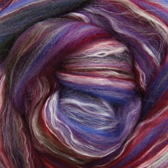 Close-up of multicolored fibre with shades of purple, blue, and red.