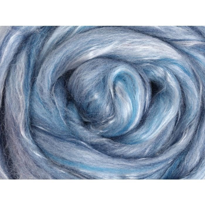 Close-up of  many shades of light blue merino and gray silk fibre blended together
